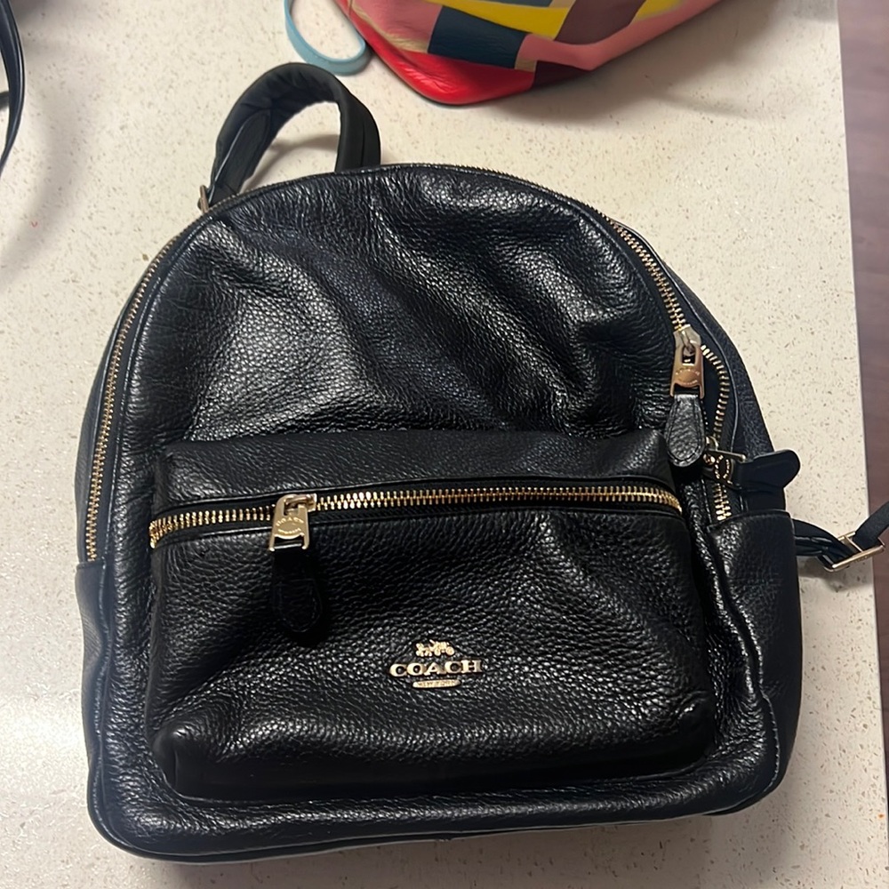 Coach black leather backpack- been in storage smoke free pet free household